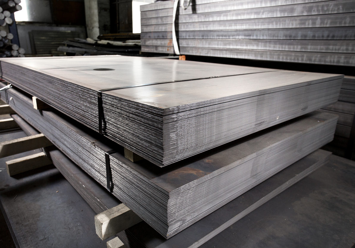 Stainless steel metal sheets deposited in stacks Stainless steel metal sheets deposited in stacks